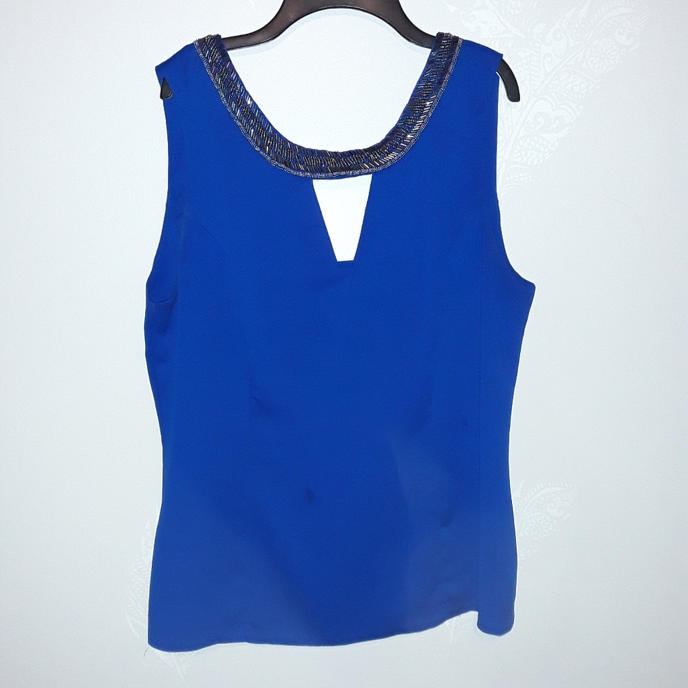 XOXO sleeveless blouse